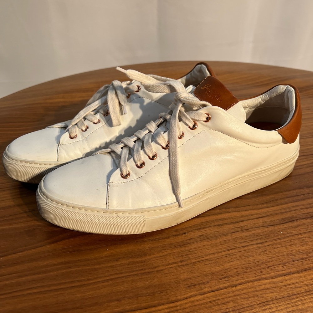 Mens white Goodman low sneakers. Size us11.